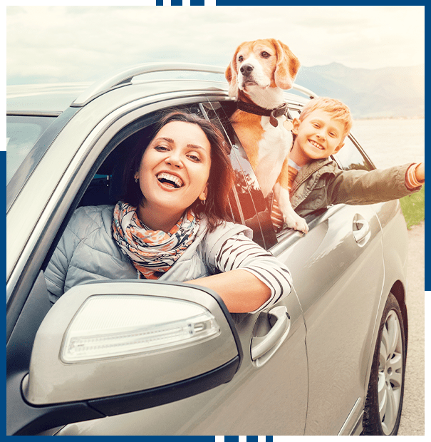 Happy family look out from car windows